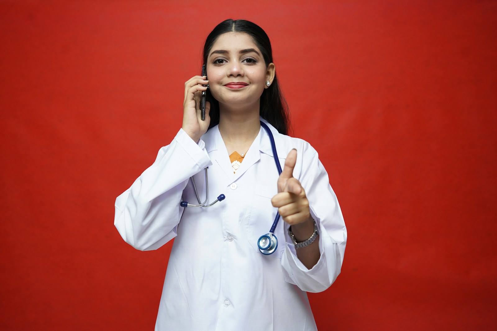 a doctor talking on the phone